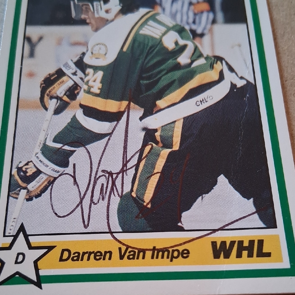 Autographed Hockey Trading Card with Green and Yellow Uniform